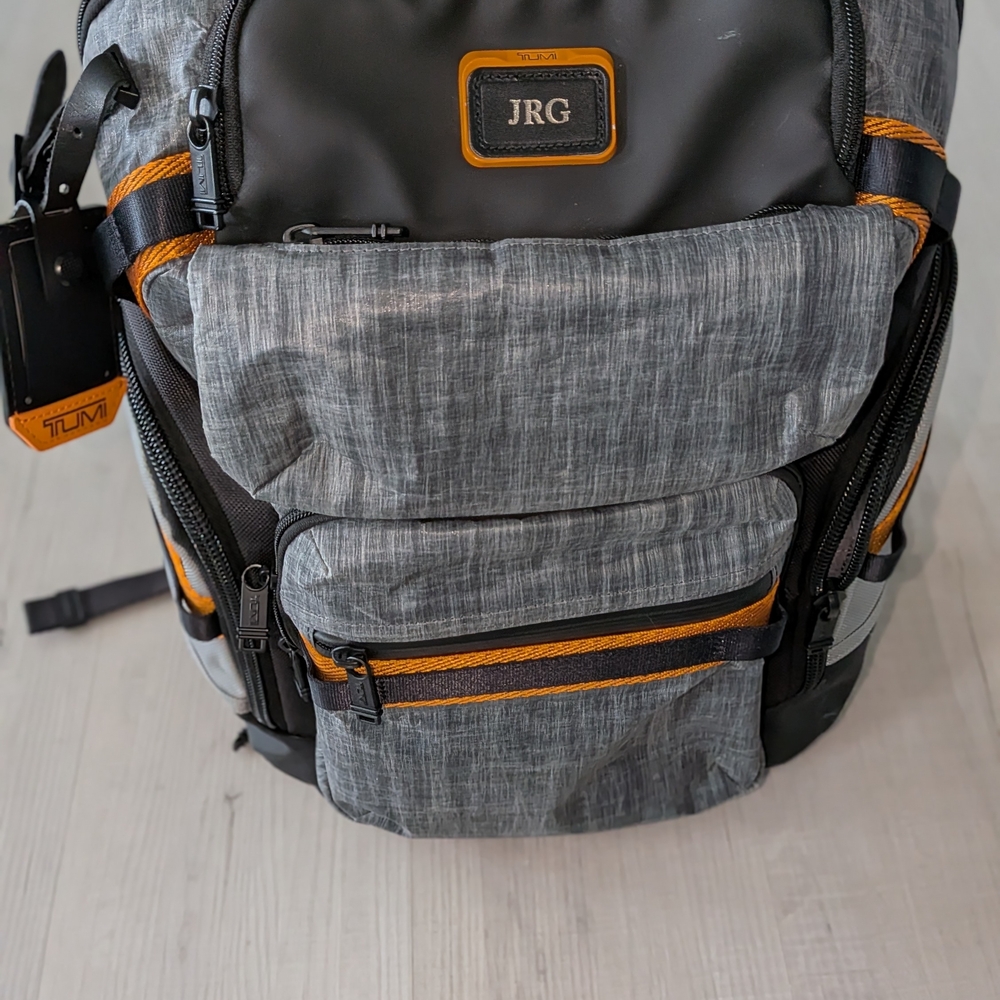 TUMI Charcoal and Black Backpack with Orange Accents